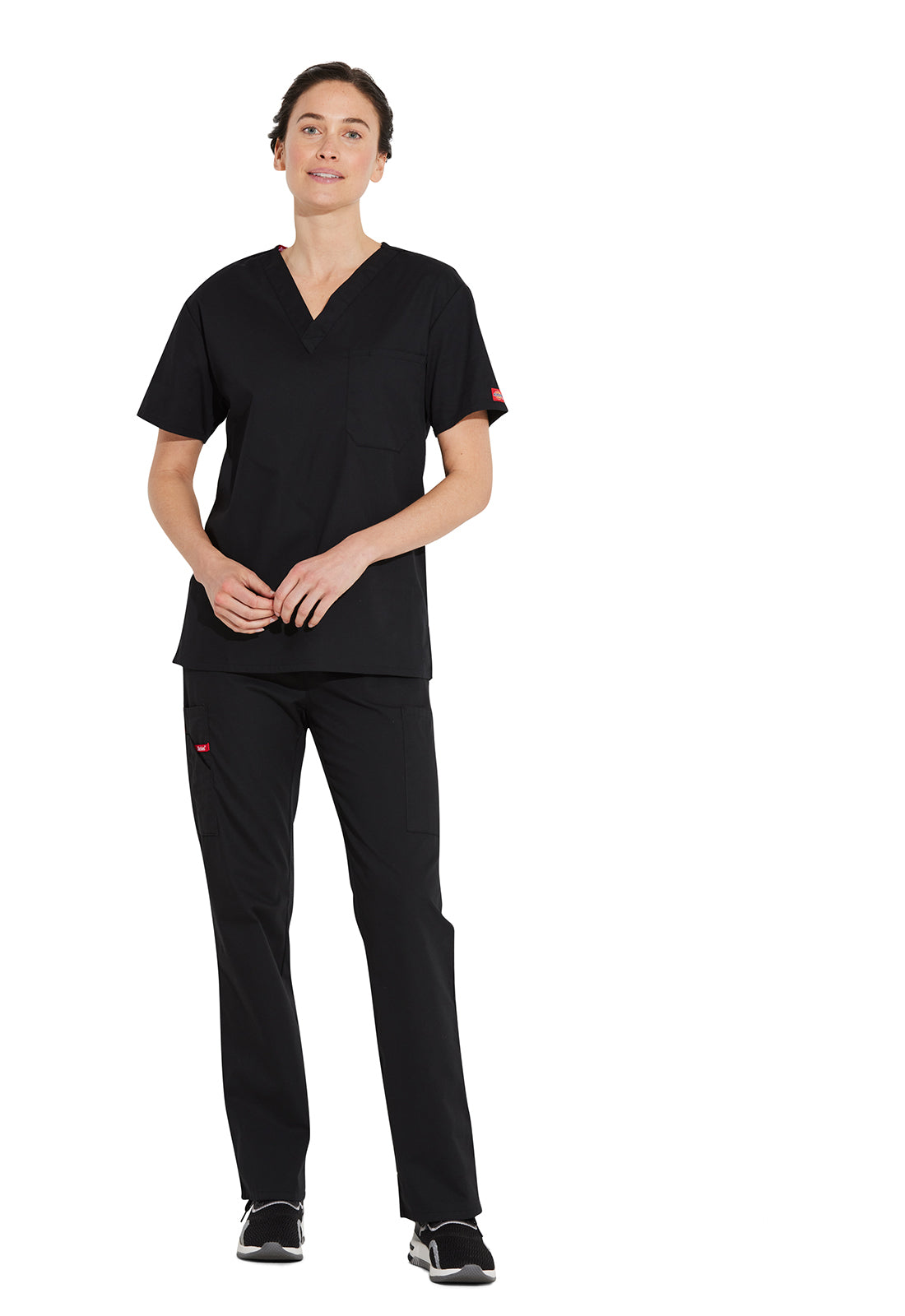 Unisex top met V-hals die in de broek gedragen kan worden met borstzak en zijsplitten