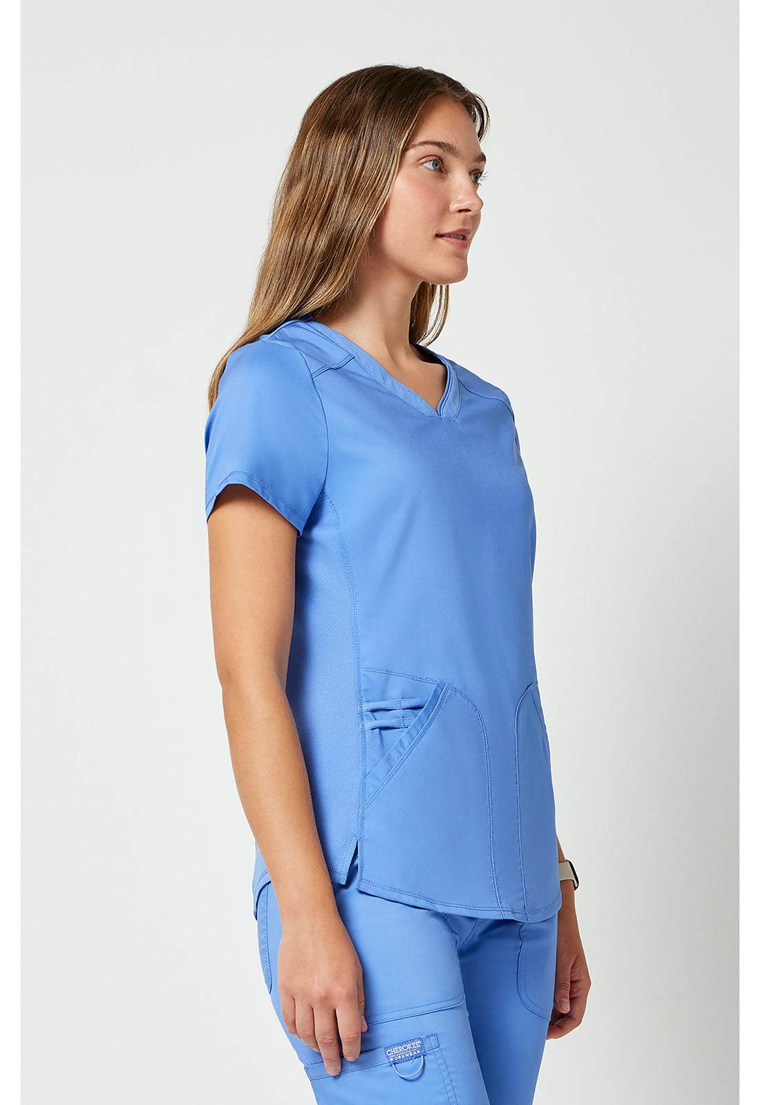 Top met V-hals met mesh details en 2-way stretch WWE601