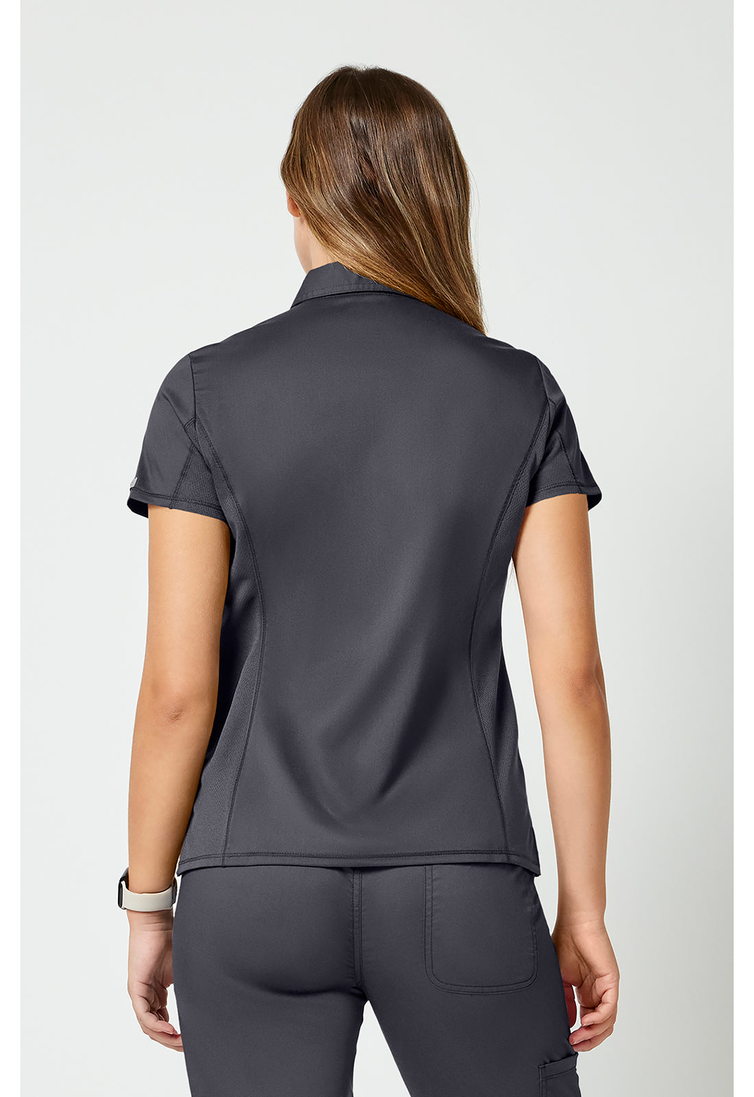 Instopbare polo met drukknoopsluiting aan de voorkant met meshpanelen en 2-way stretch WWE698